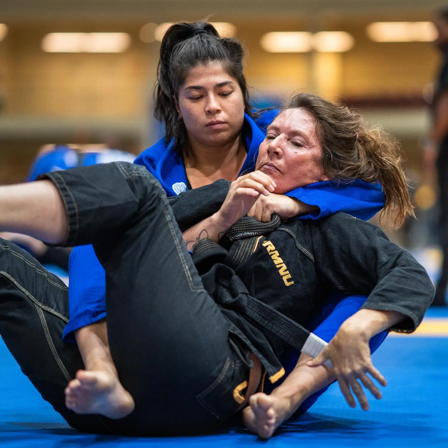 Professor Lydia Bergamasco competing in Brazilian Jiu-Jitsu