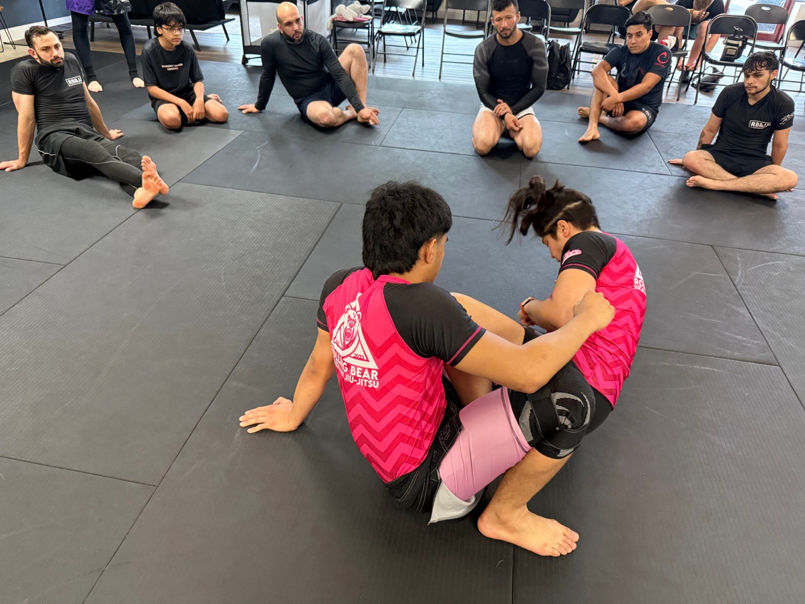 Professor Lydia Bergamasco teaching an adult No-Gi Brazilian Jiu-Jitsu class at Rolling Bear BJJ