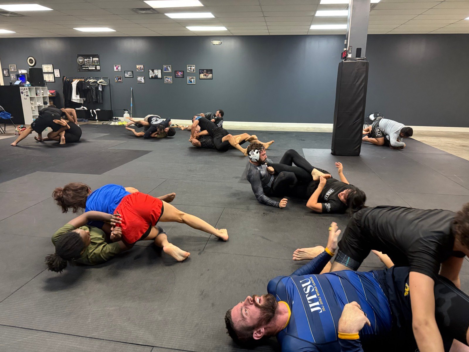 Adult No-Gi students practicing together at Rolling Bear BJJ