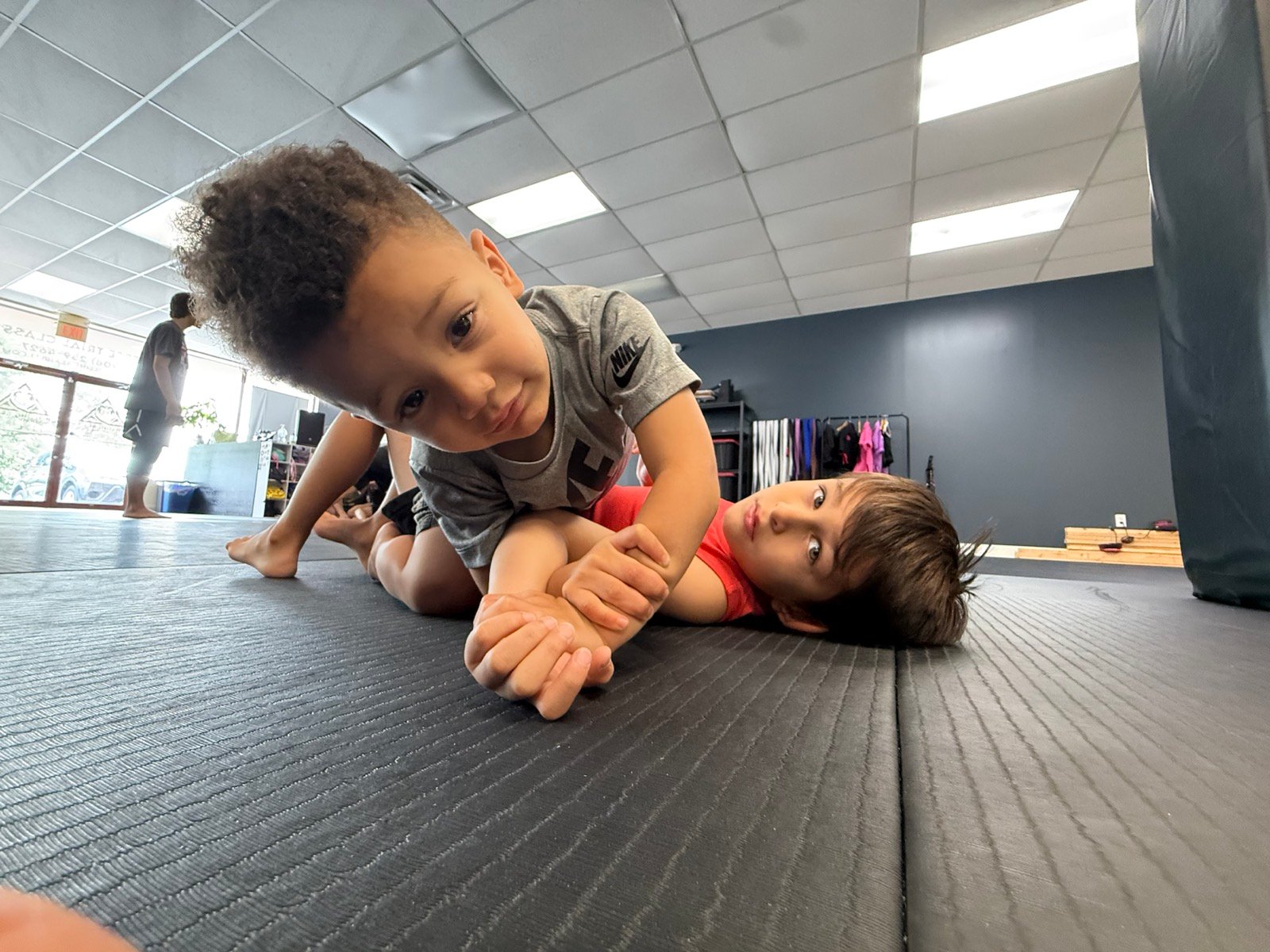 Cub Club I students practicing an age-appropriate partner drill at Rolling Bear BJJ