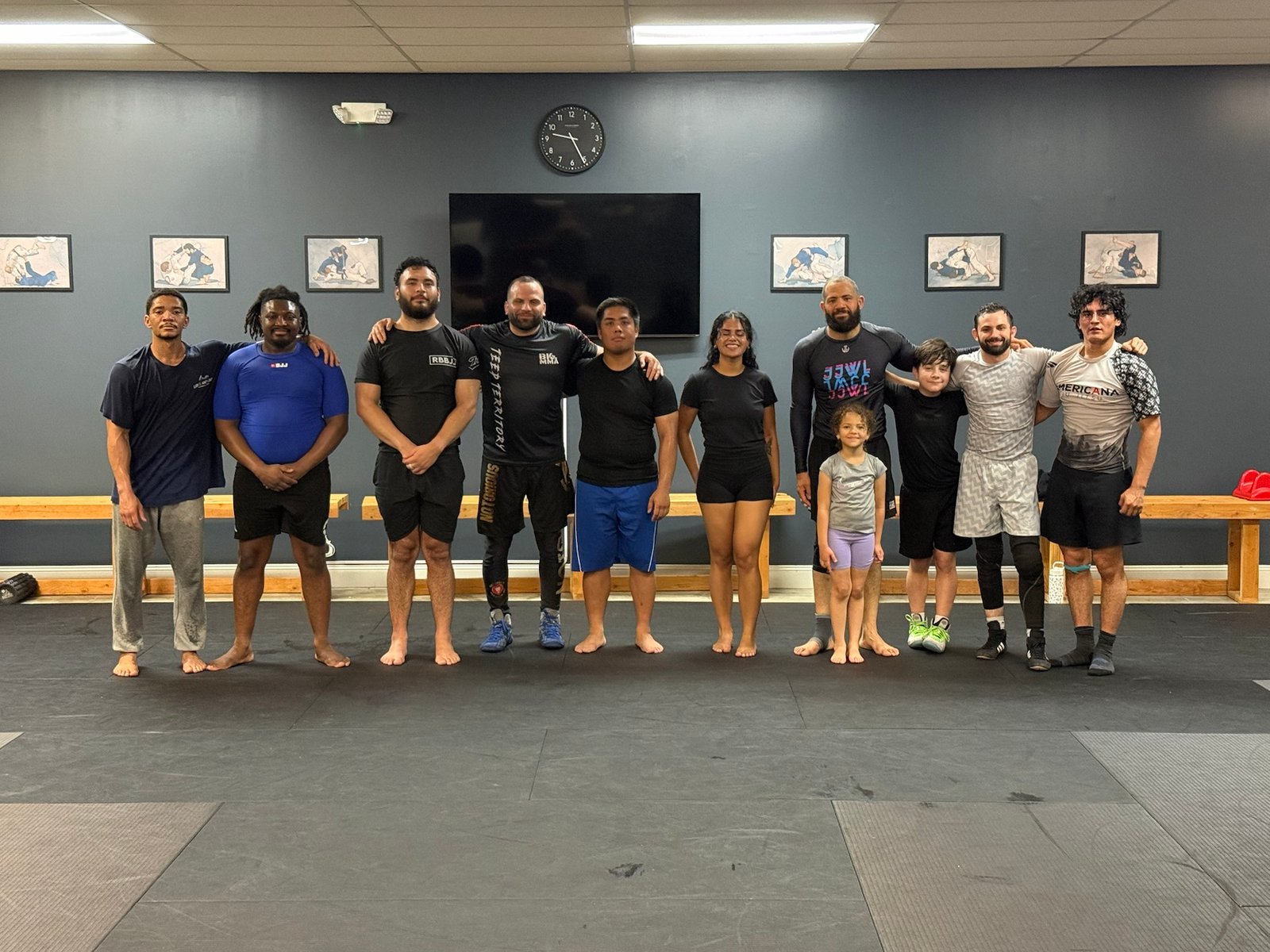 Coach Walid Elashri with students after adult wrestling training at Rolling Bear BJJ in Kenilworth, New Jersey